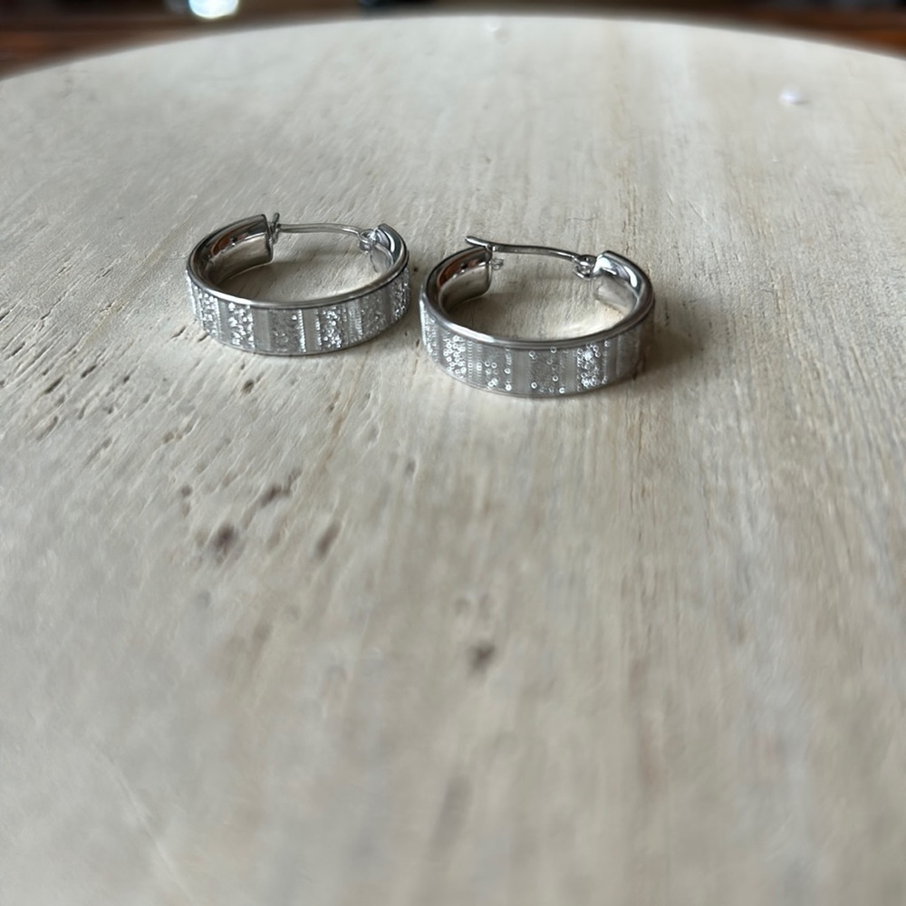 Silver detailed hoops